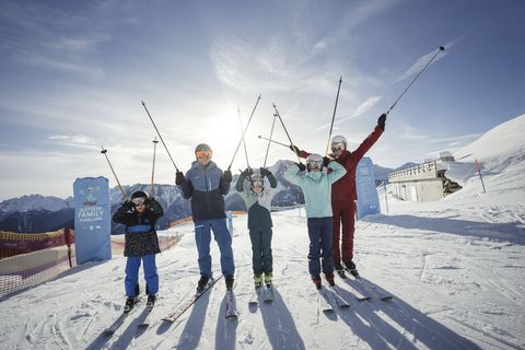 The Aletsch Arena family ski pass allows children and parents to have fun on the Gletschi Family Funslope in the winter sun with a view of the mountains